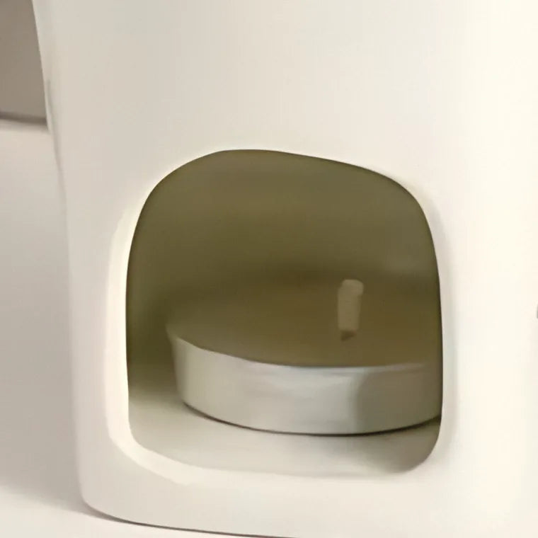 Bougie chauffe-plat sous le MeltaMug blanc